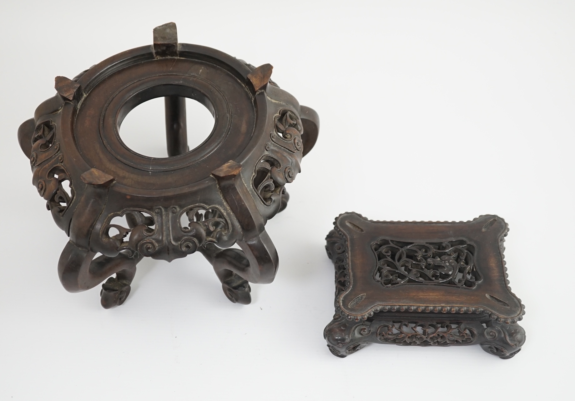 A large Chinese hongmu vase stand and a rectangular hongmu fangding censer stand, late 19th century